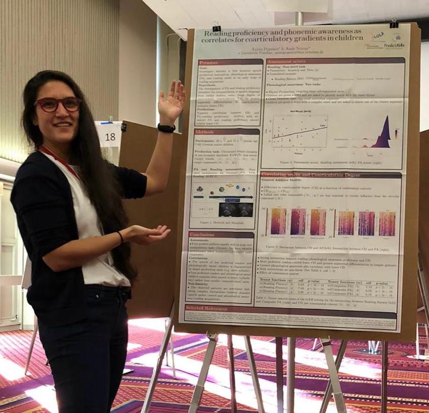 Anisia Popescu presenting a research poster
